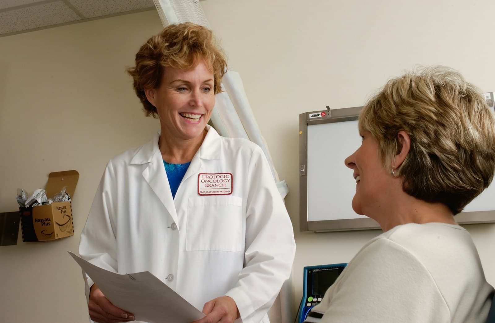 A clinician talking with a patient.