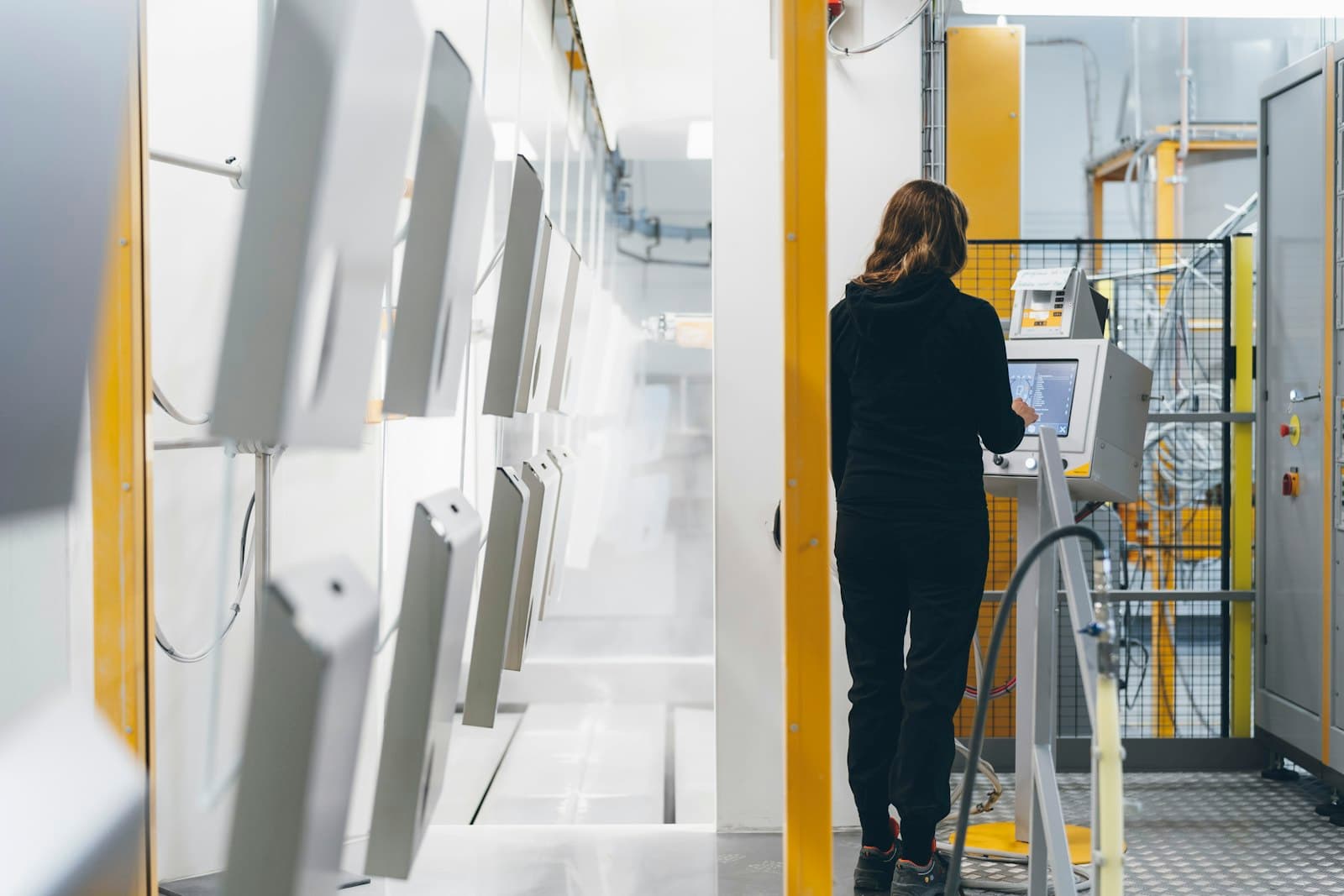 An IT technician in a server room.