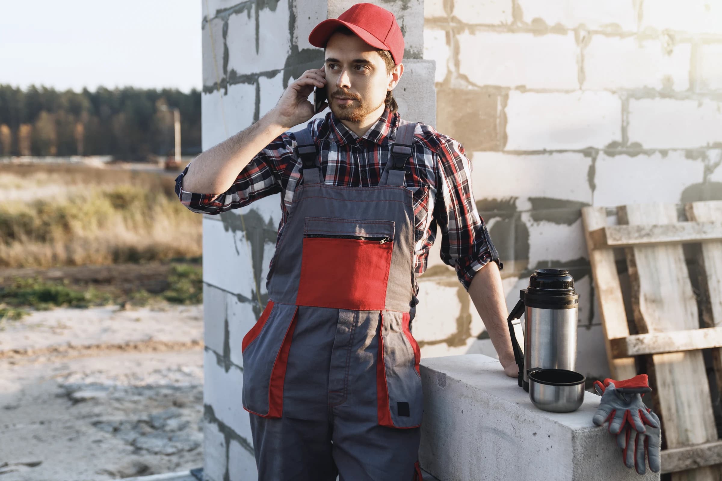Worker checking their phone at the end of the day